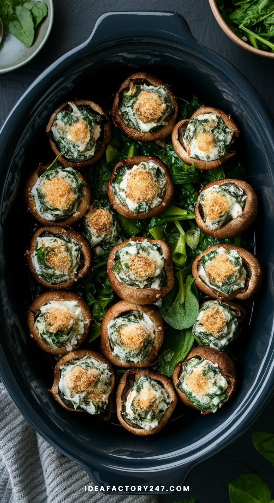 Juicy stuffed mushrooms filled with creamy spinach and ricotta, garnished with Parmesan and served warm from the crockpot on a sleek platter.