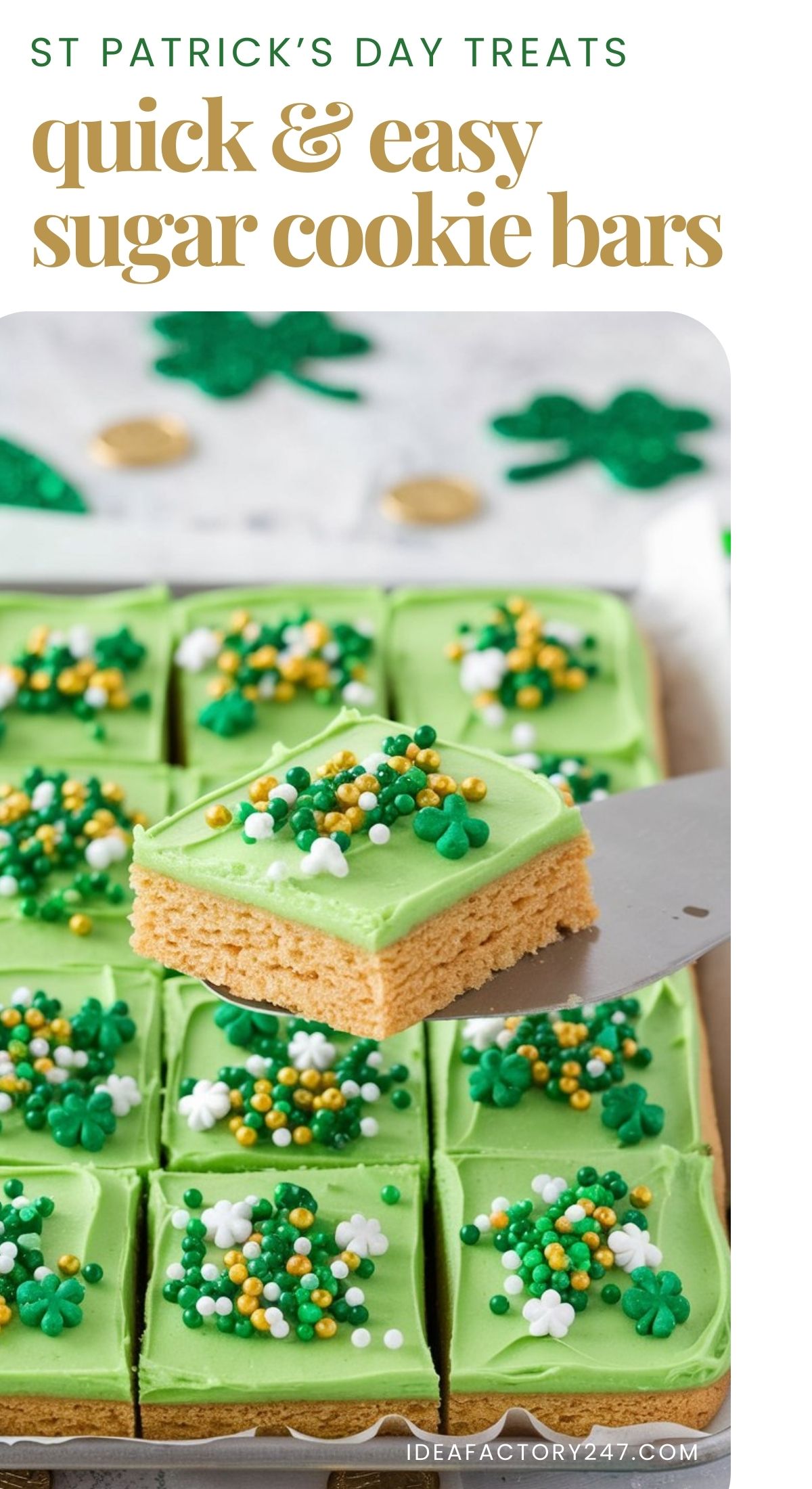 A tray of golden sugar cookie bars cut into squares, topped with vibrant green frosting and sprinkled with St. Patrick’s Day-themed sprinkles. The bars sit on a festive tablecloth with shamrocks and gold coins scattered around. A single cookie bar is lifted on a spatula, showing the thick, soft interior.