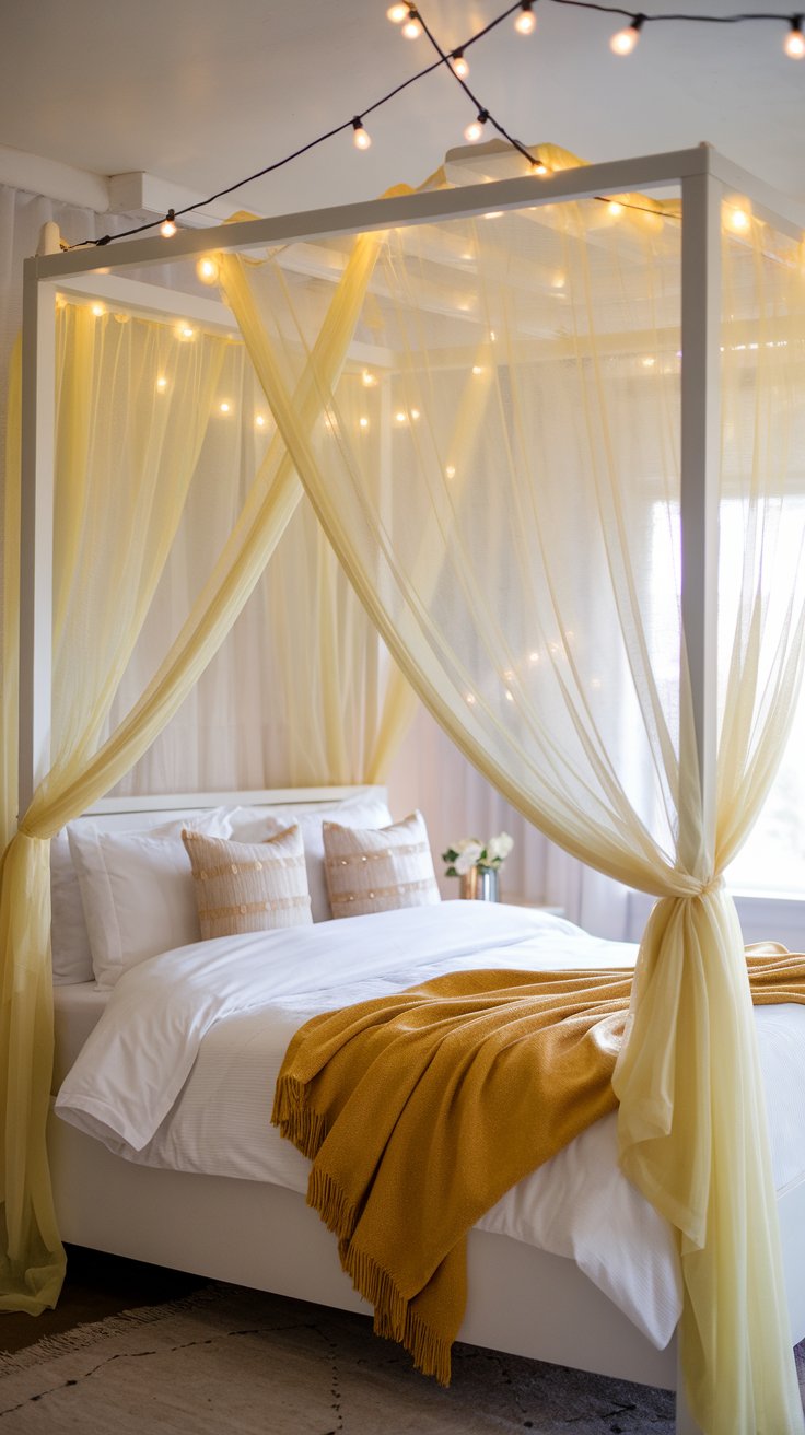 A dreamy bedroom featuring a white canopy bed draped with flowing yellow sheer curtains. The bed is styled with white bedding and a golden throw blanket, while string lights twinkle above the frame, adding a soft, romantic glow.