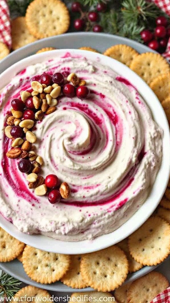 A creamy cranberry dip swirled with cranberry sauce, garnished with nuts and cranberries, surrounded by crackers.