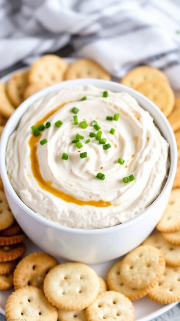 A bowl of Sweet Chili Cream Cheese Dip surrounded by crackers