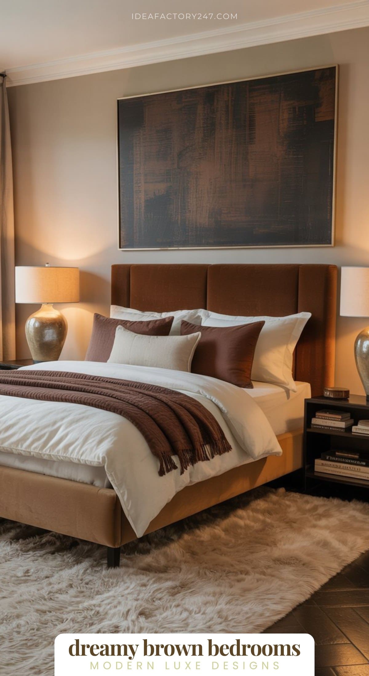A modern bedroom with a brown upholstered bed, white and brown bedding, two gold lamps on bedside tables, a large abstract artwork above the bed, and a soft beige rug on the floor. The text reads, dreamy brown bedrooms.