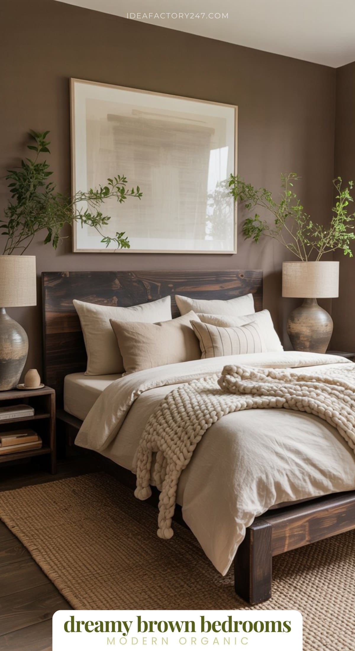 A cozy bedroom with brown walls, a dark wood bed, beige bedding, chunky knit blanket, bedside tables with lamps, potted plants, and a large framed art piece above the bed. Text reads: dreamy brown bedrooms, modern organic.