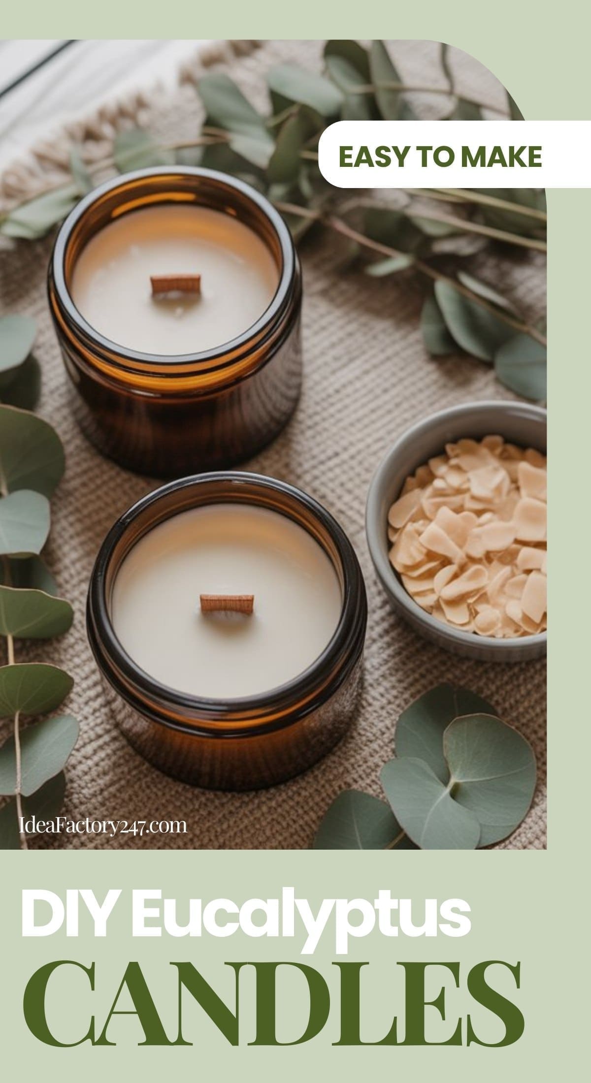 Two brown glass jars with wood wick, non-toxic DIY candles sit on a table surrounded by eucalyptus leaves and a small bowl of wax flakes. The text reads Easy to make. DIY Eucalyptus Candles.