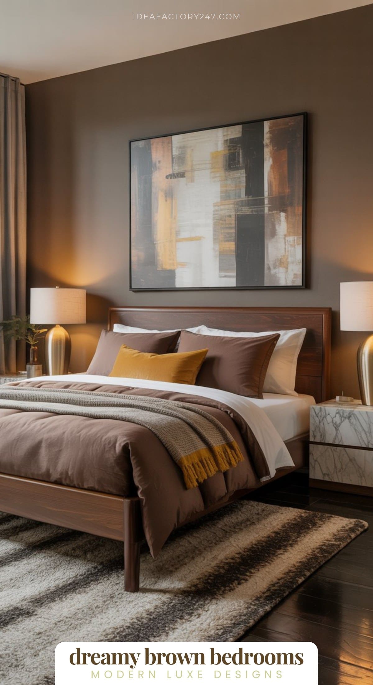 A modern bedroom with brown walls, a wooden bed with brown and white bedding, a mustard throw, two marble-topped nightstands with lamps, abstract wall art, and a striped rug. Text reads: dreamy brown bedrooms.