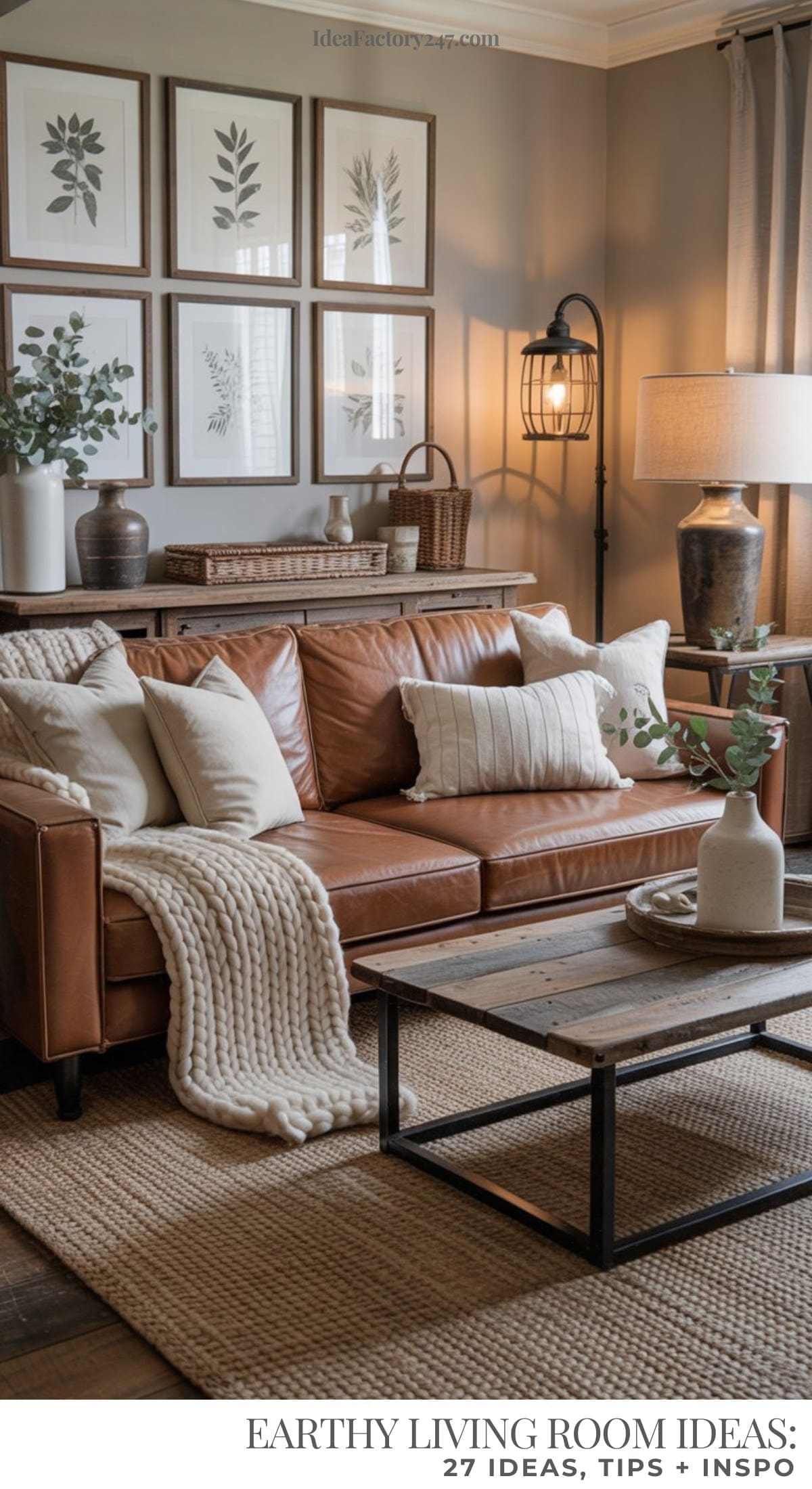 A cozy, earthy living room with a brown leather sofa, neutral pillows, a chunky knit throw, wooden coffee table, potted plants, botanical wall art, and a woven rug creates an inviting atmosphere.