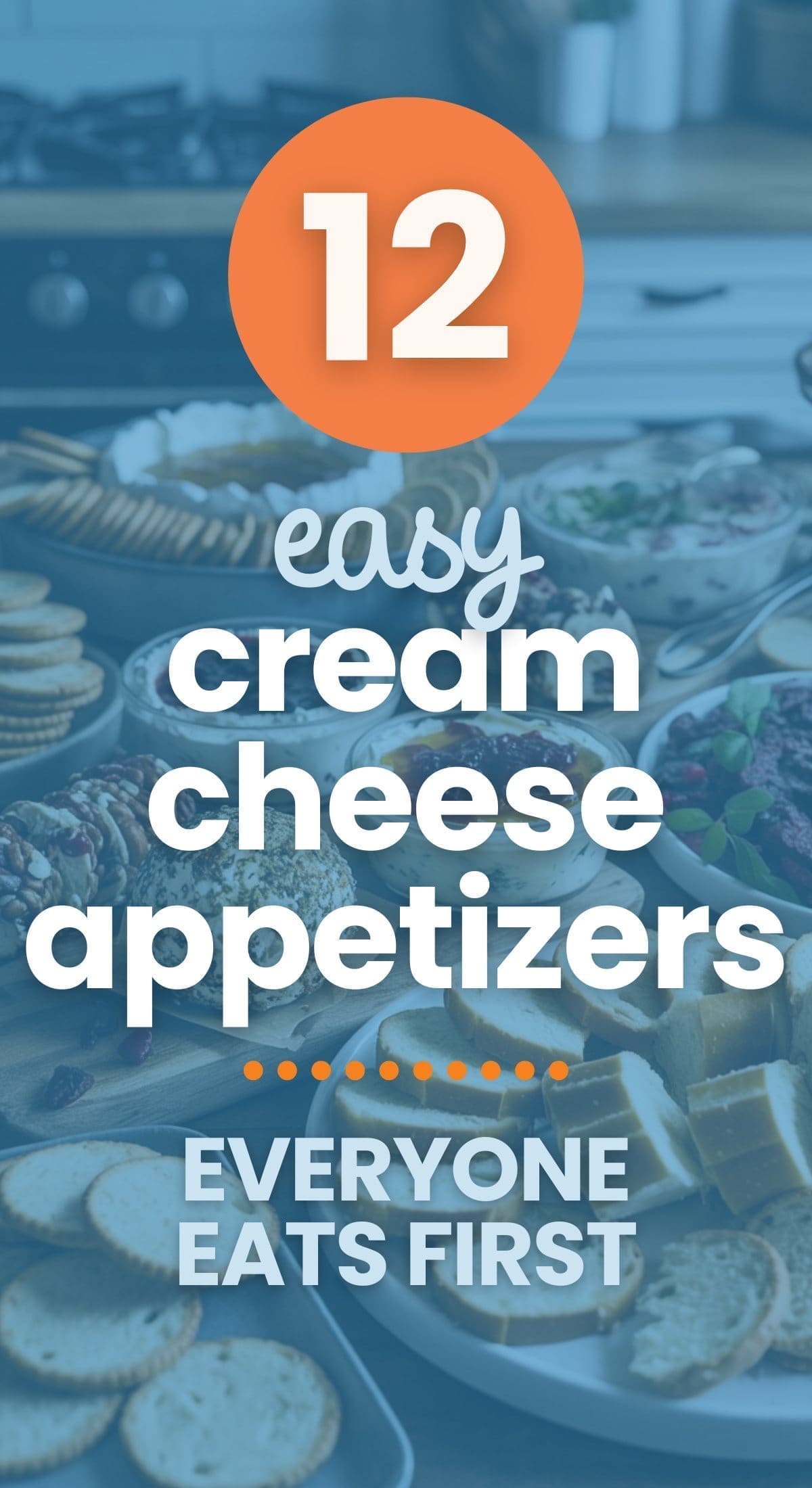 A graphic with text overlay reading 12 easy cream cheese appetizers, everyone eats first over a blurred image of a table filled with various appetizers, crackers, cheeses, and dips in a kitchen setting.