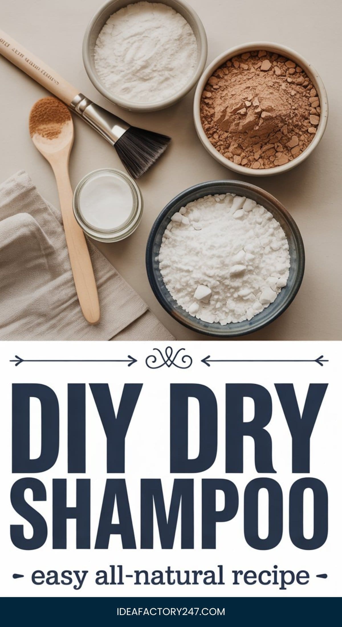 Three bowls containing flour, cocoa powder, and cornstarch, next to a brush and spoon on a cloth, above text reading “DIY Dry Shampoo: Easy All-Natural Recipe.”.