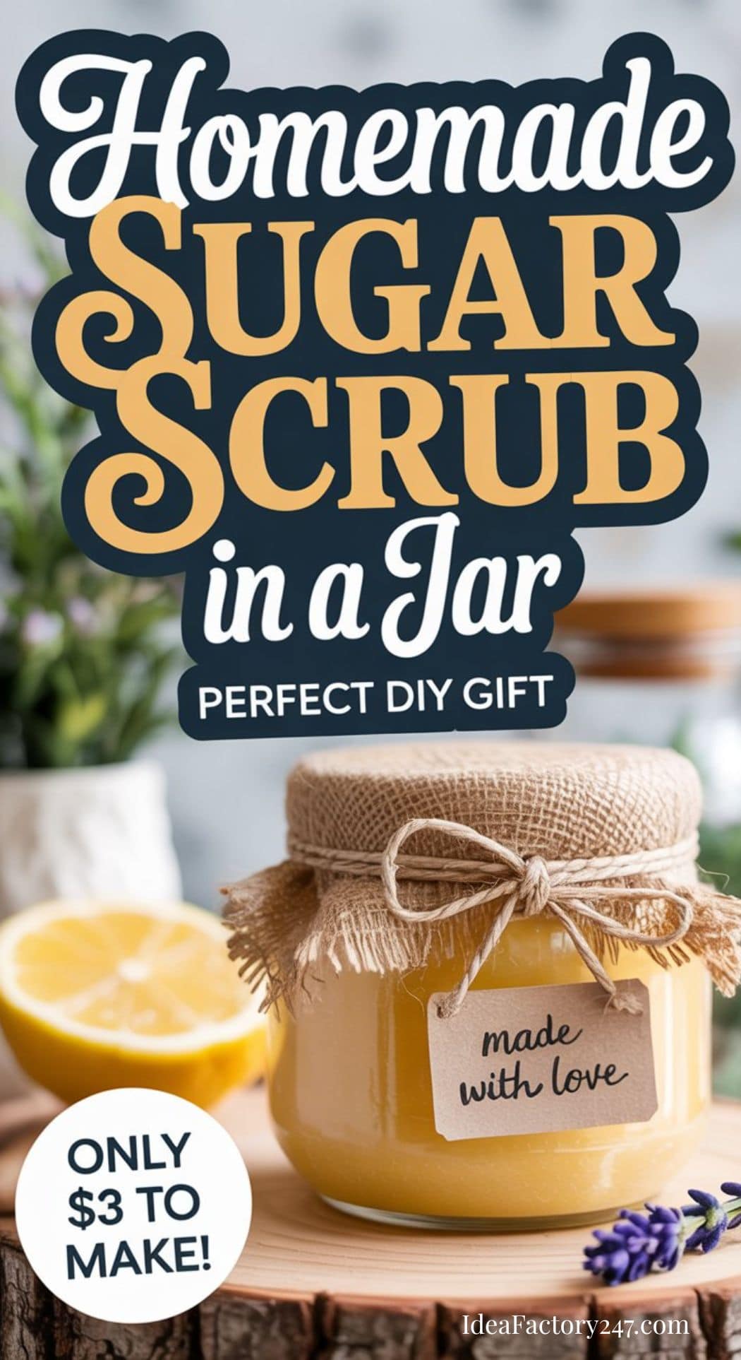 A labeled jar of DIY Lemon Sugar Scrub with a “made with love” tag sits on a wooden surface, surrounded by sliced lemon and flowers. Text reads: DIY Lemon Sugar Scrub in a Jar. Perfect gift idea—only $3 to make!.