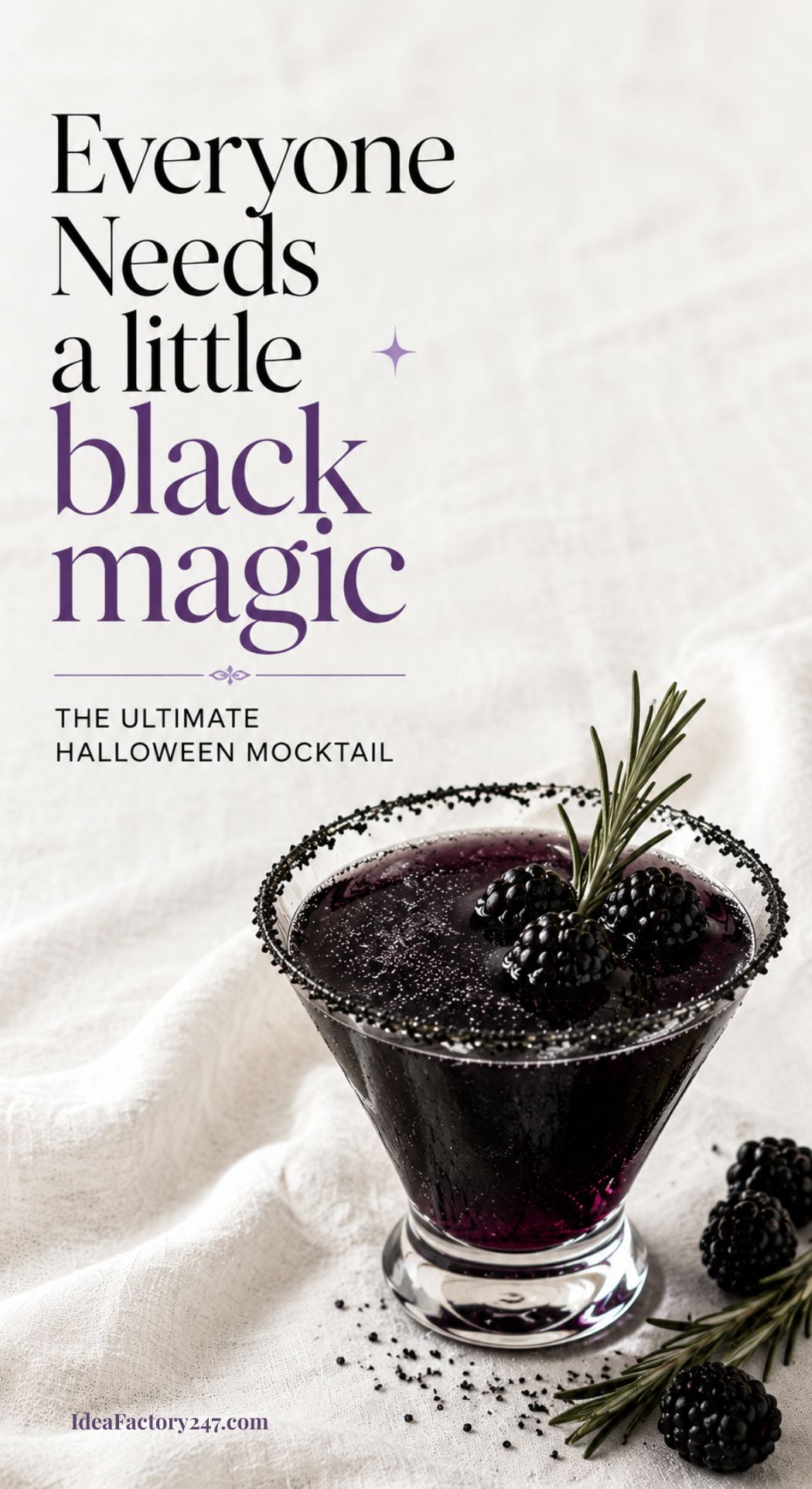 A dark purple mocktail in a glass rimmed with black sugar, garnished with blackberries and rosemary, sits on a light cloth. Text reads: Everyone Needs a little black magic. The ultimate Halloween mocktail.