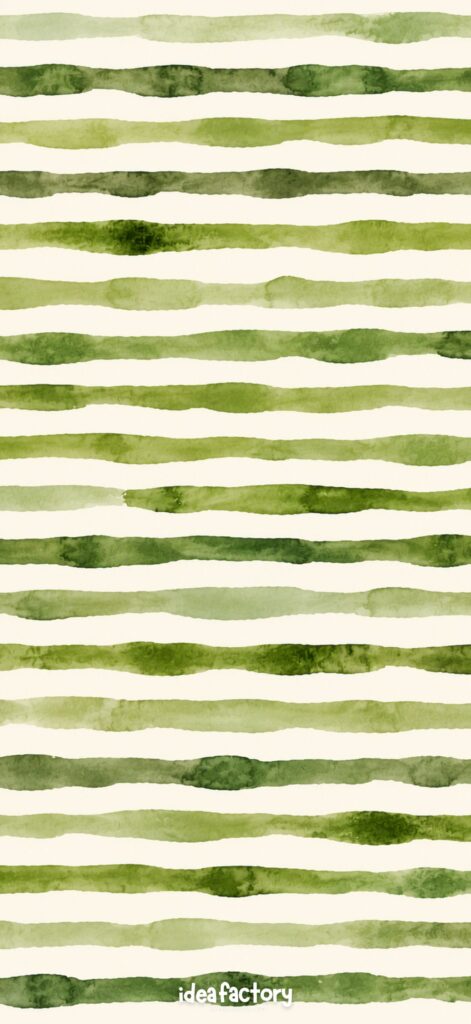 Irregular horizontal green watercolor stripes on a light background, creating an organic, hand-painted pattern. The text ideafactory appears at the bottom of the image in small, white letters.