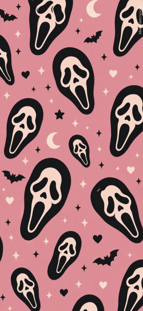 Pattern of black and white ghost faces, cartoon bats, crescent moons, stars, and hearts on a pink background.