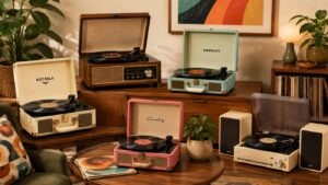 Five vintage-style record players in different colors are displayed on wooden furniture and a round table, surrounded by potted plants, vinyl records, speakers, and colorful wall art in a retro-themed living room.