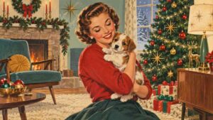 A smiling woman in a festive room hugs a puppy near a Christmas tree, fireplace, and wrapped gifts. The room is decorated with ornaments, garland, and candles, creating a warm holiday atmosphere.