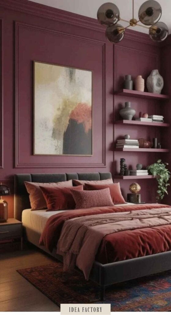 A bedroom with dark red walls, a bed featuring layered bedding, a large abstract painting, and wall-mounted shelving holding various vases and decor.